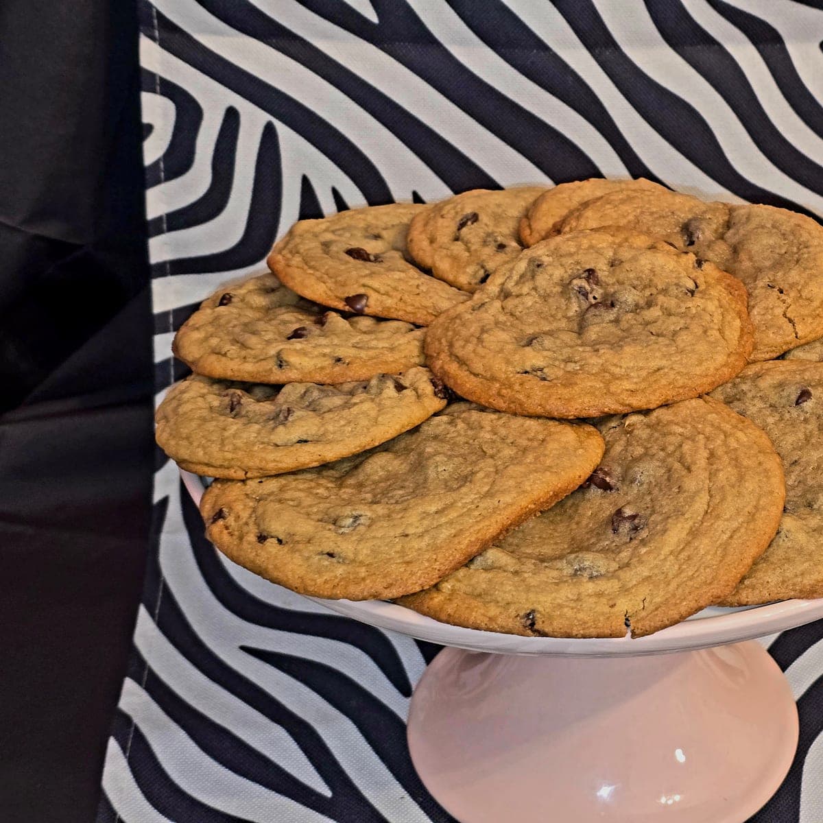 Sourdough chocolate chip cookies cooling on a rack