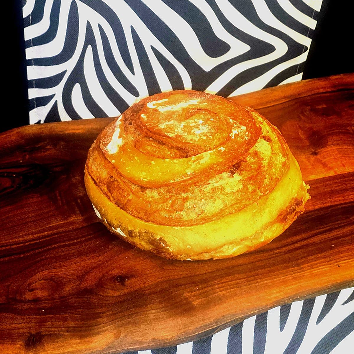 Cinnamon swirl sourdough loaf dusted with cinnamon sugar