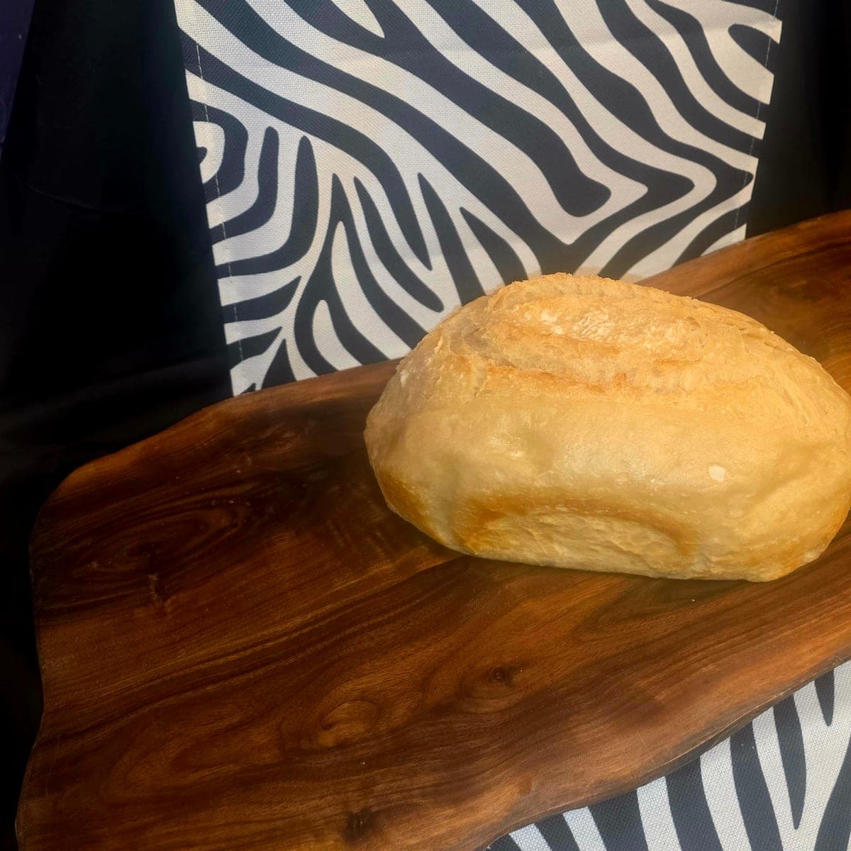 The OG Classic Sourdough loaf with a crackly golden crust